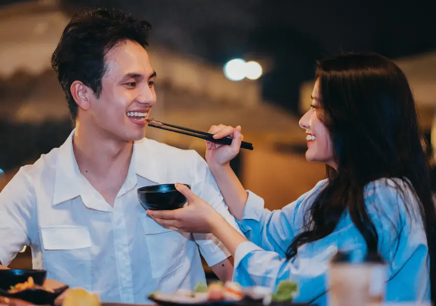 Couples sharing food