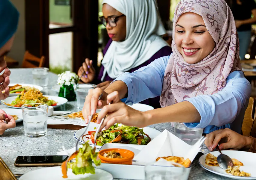 People enjoying food at Flayva